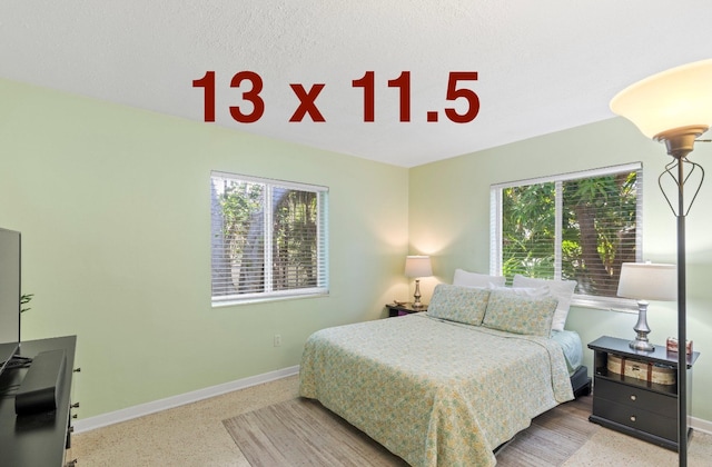 7563 Gulfstream Blvd, Marathon, FL 33050 - bedroom featuring multiple windows and baseboards