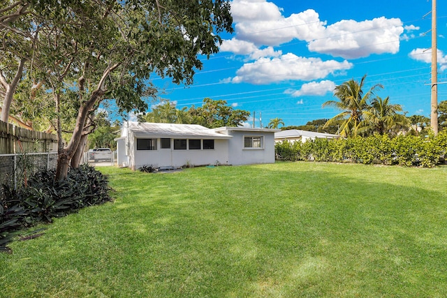 exterior space with a lawn