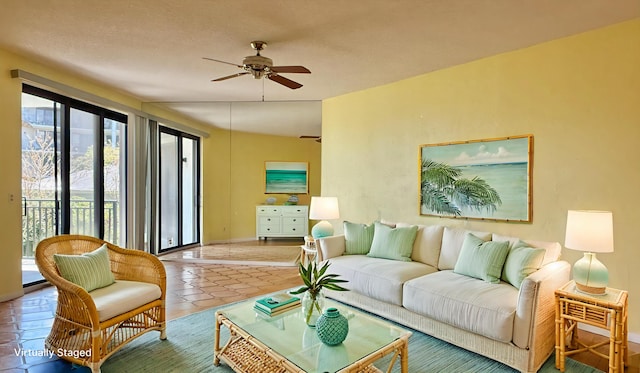 1800 Atlantic Blvd Unit C130, Key West, FL 33040 - tiled living room featuring ceiling fan and baseboards