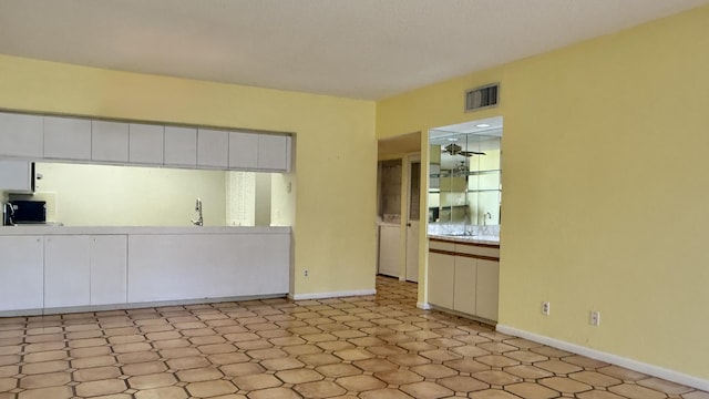 1800 Atlantic Blvd Unit C130, Key West, FL 33040 - unfurnished room with baseboards and a sink