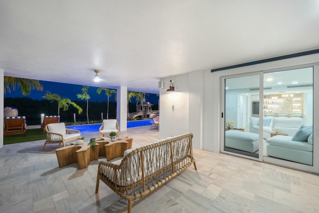 view of patio with a pool and outdoor lounge area