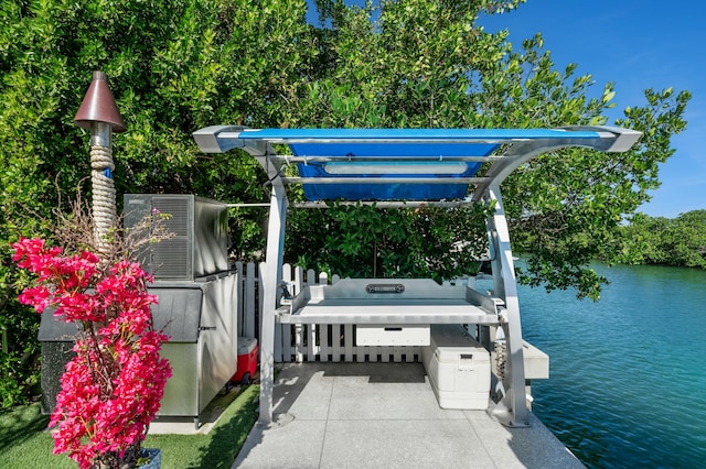 dock area featuring a water view