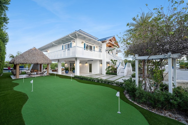 exterior space featuring a gazebo, a balcony, a pergola, and a patio