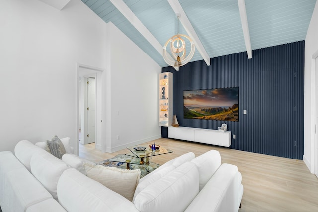 living room featuring hardwood / wood-style floors and lofted ceiling with beams