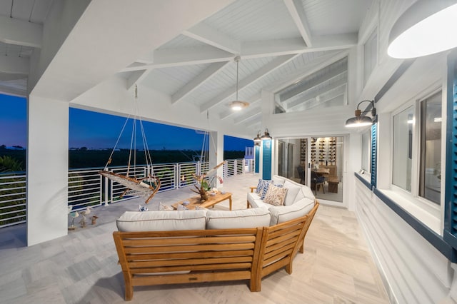 view of patio featuring a balcony and outdoor lounge area