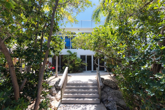 321 Calzada De Bougainville, Marathon, FL 33050 - back of house with stucco siding