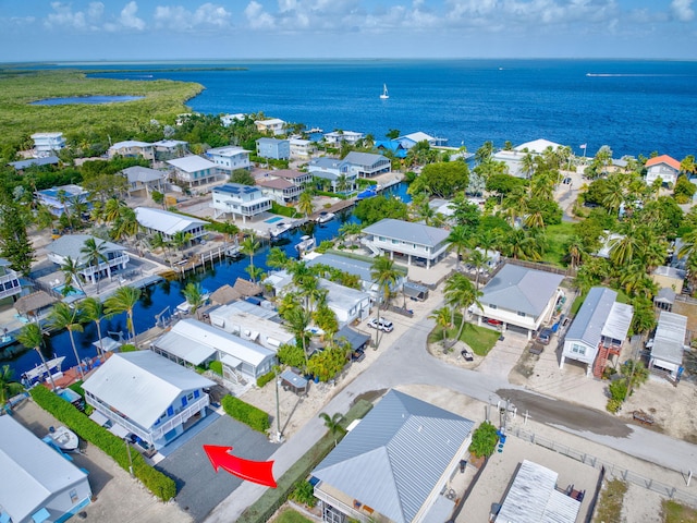 drone / aerial view featuring a water view