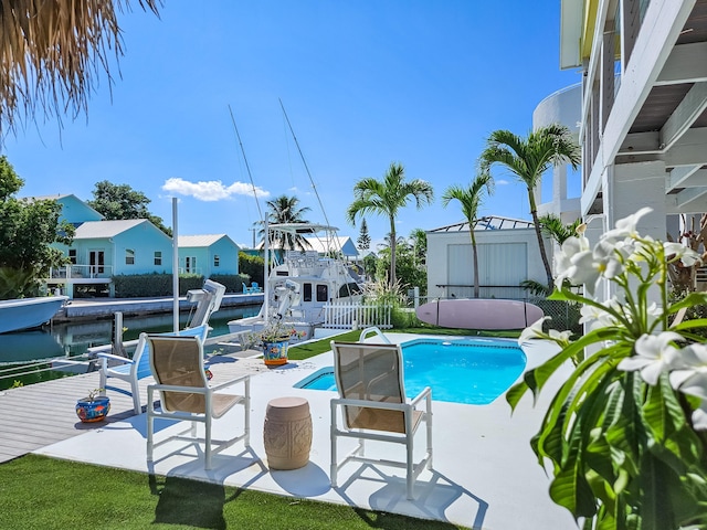 view of pool featuring a patio