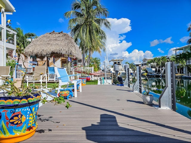 dock area featuring a gazebo and a water view