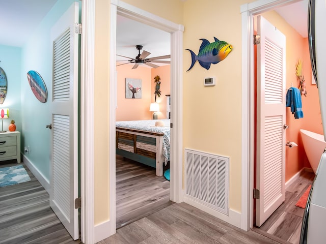 corridor featuring hardwood / wood-style flooring