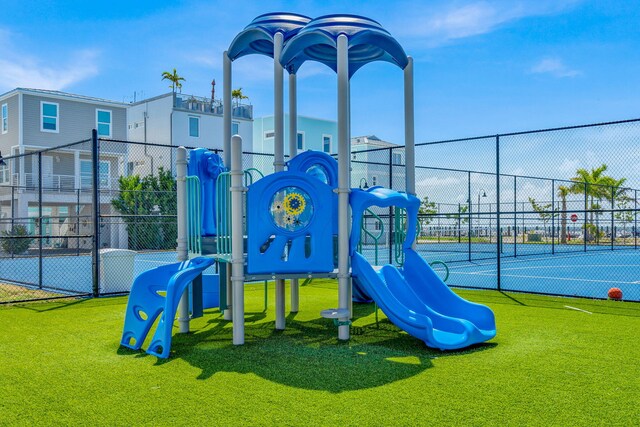 94825 Overseas Hwy Unit 61, Key Largo, FL 33037 - view of playground with a lawn