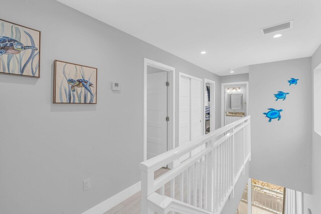 94825 Overseas Hwy Unit 61, Key Largo, FL 33037 - corridor featuring light wood-type flooring