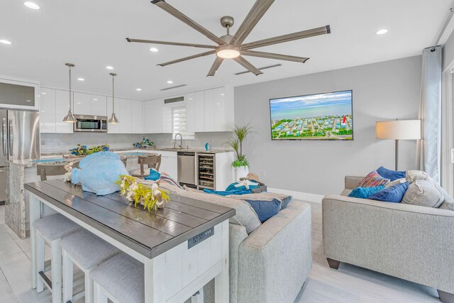 94825 Overseas Hwy Unit 61, Key Largo, FL 33037 - interior space with wine cooler and sink