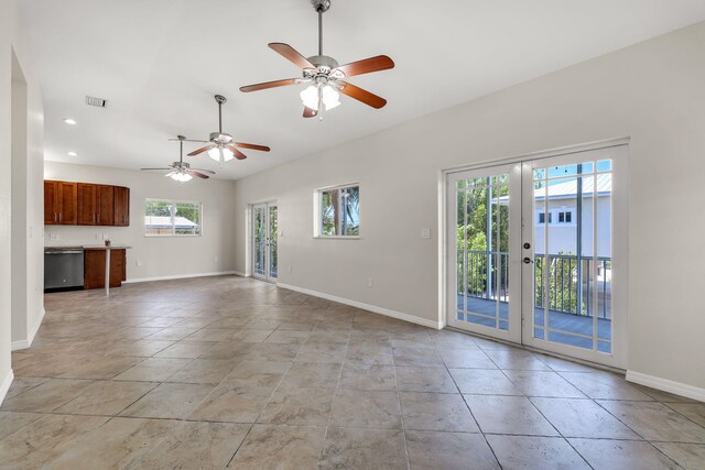 973 Gibraltar Rd, Key Largo, FL 33037 - unfurnished living room featuring a ceiling fan, french doors, baseboards, recessed lighting, and light tile patterned flooring