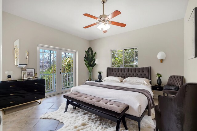 973 Gibraltar Rd, Key Largo, FL 33037 - bedroom featuring access to outside, multiple windows, french doors, and light tile patterned floors