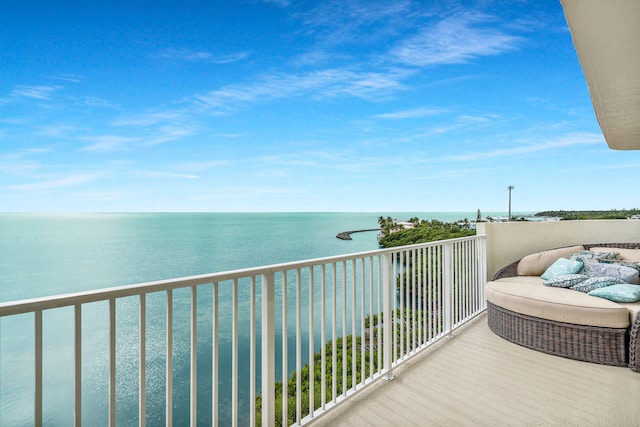 balcony featuring a water view