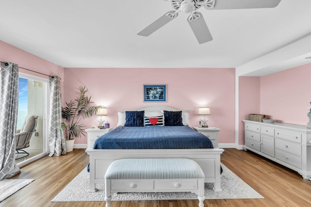 bedroom with ceiling fan, access to exterior, and light wood-type flooring