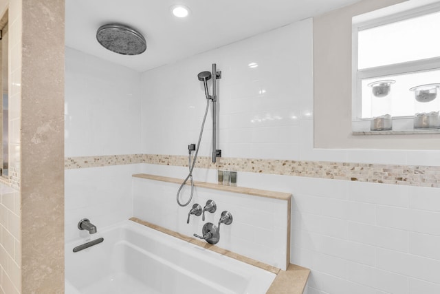 bathroom featuring tile walls