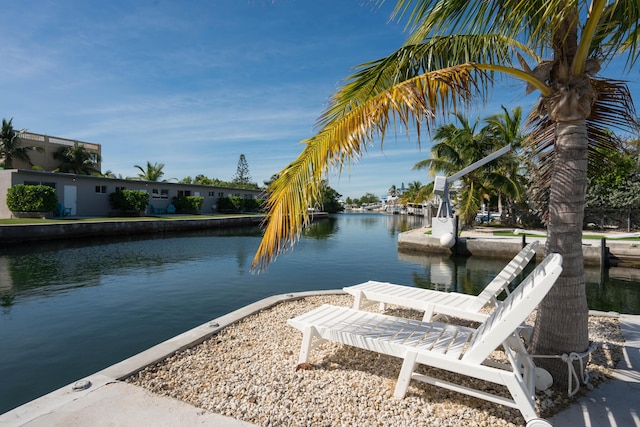 dock area featuring a water view