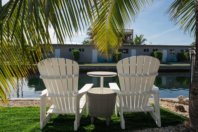 view of patio / terrace with a water view