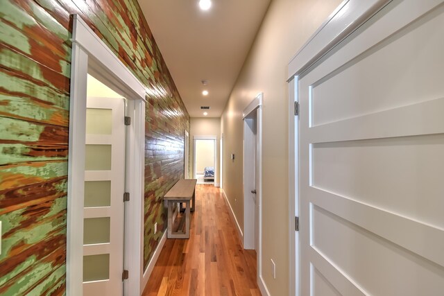 hallway with light wood-type flooring