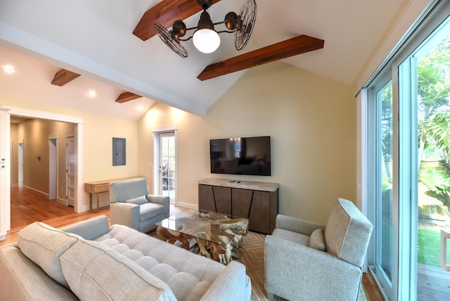 living room featuring vaulted ceiling with beams, electric panel, and light hardwood / wood-style floors