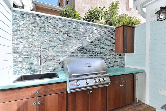 view of patio / terrace with grilling area and exterior kitchen