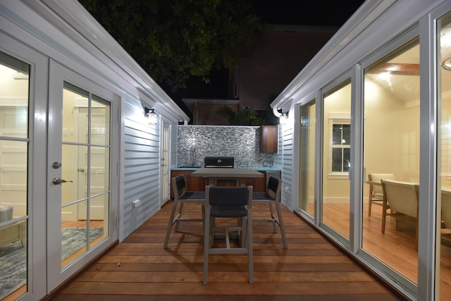 deck with a grill and french doors