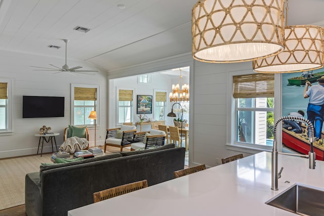 living room with lofted ceiling, wooden ceiling, visible vents, and baseboards