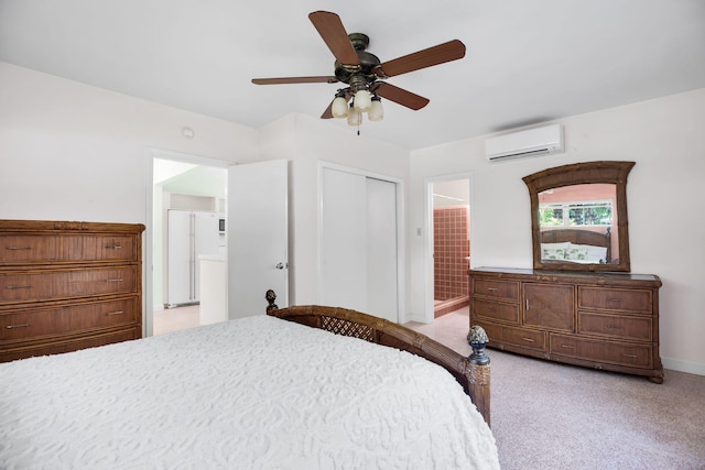 carpeted bedroom with a wall mounted air conditioner, ceiling fan, and a closet