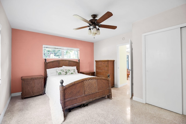 bedroom featuring a closet and ceiling fan