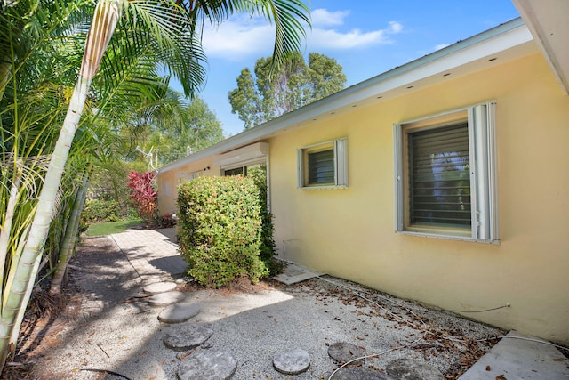 view of home's exterior with a patio area