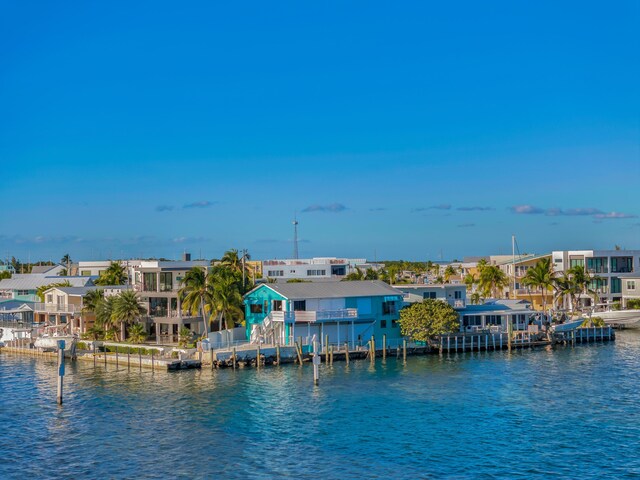 property view of water featuring a dock