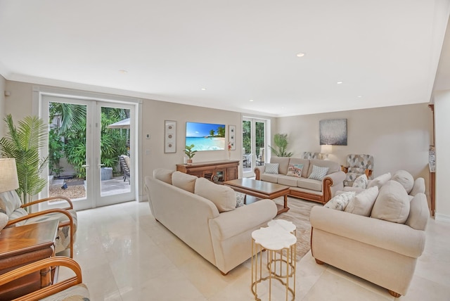 living room featuring crown molding and french doors