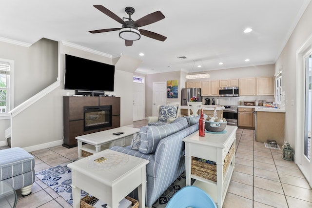 230 Golf Club Dr, Key West, FL 33040 - living room with ornamental molding, light tile patterned floors, ceiling fan, and a fireplace