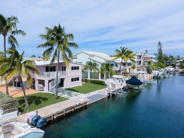 121 Lisbon Ct, Islamorada, FL 33036 - view of water feature featuring boat lift, stairs, and a dock