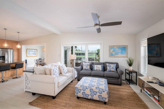 121 Lisbon Ct, Islamorada, FL 33036 - living room with vaulted ceiling with beams, a ceiling fan, and light carpet