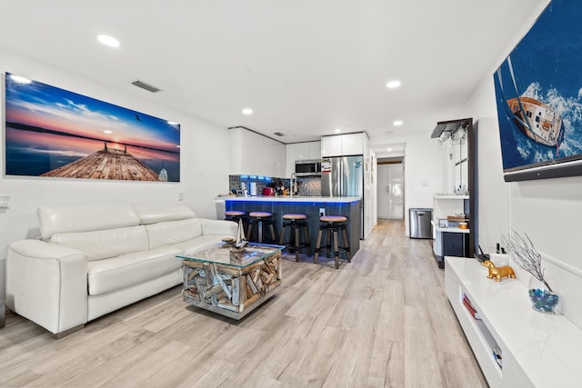 living room with light wood-type flooring