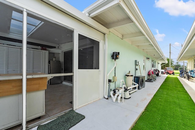 view of patio featuring water heater