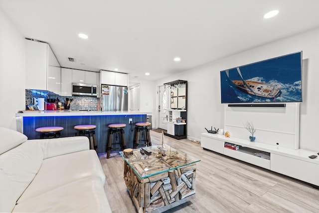 living room featuring light hardwood / wood-style flooring