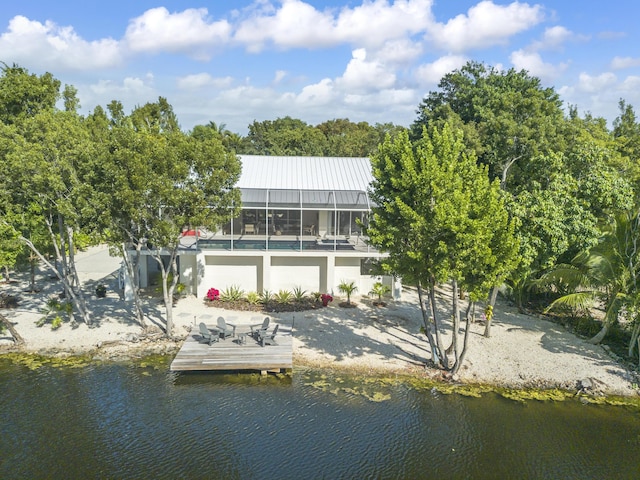 10 Mahogany Ln, Key Largo, FL 33037 - back of property with a water view and a metal roof