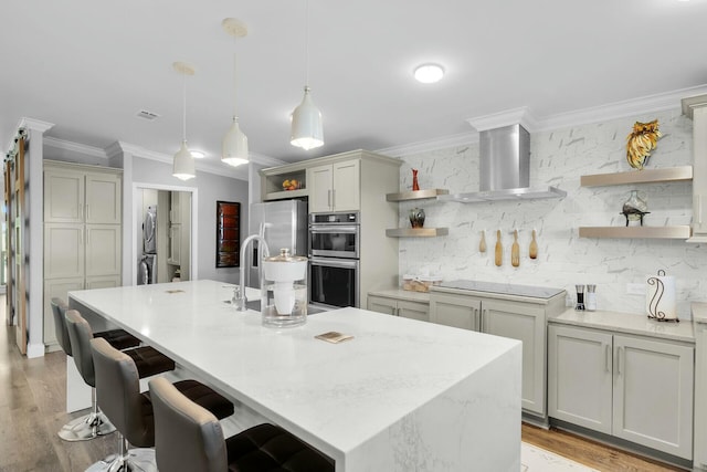 17346 Keystone Rd, Sugarloaf, FL 33042 - kitchen featuring wall chimney range hood, open shelves, stainless steel appliances, ornamental molding, and stacked washer and clothes dryer