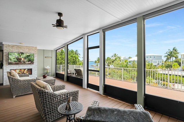 17346 Keystone Rd, Sugarloaf, FL 33042 - sunroom featuring a ceiling fan and a fireplace