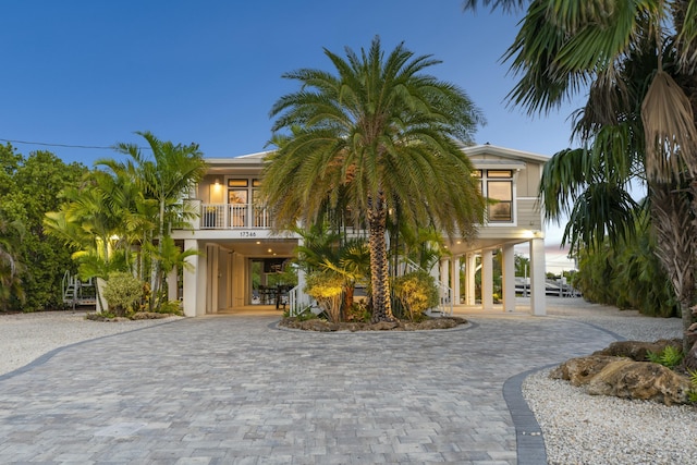 17346 Keystone Rd, Sugarloaf, FL 33042 - beach home featuring a carport, a balcony, and curved driveway