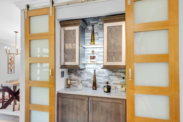 17346 Keystone Rd, Sugarloaf, FL 33042 - bar featuring ornamental molding, a bar, and tasteful backsplash