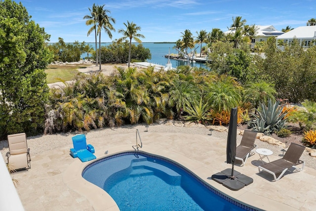 17346 Keystone Rd, Sugarloaf, FL 33042 - outdoor pool featuring a water view and a patio