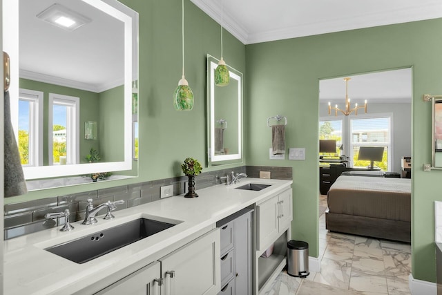 17346 Keystone Rd, Sugarloaf, FL 33042 - ensuite bathroom with marble finish floor, a sink, a notable chandelier, and ornamental molding