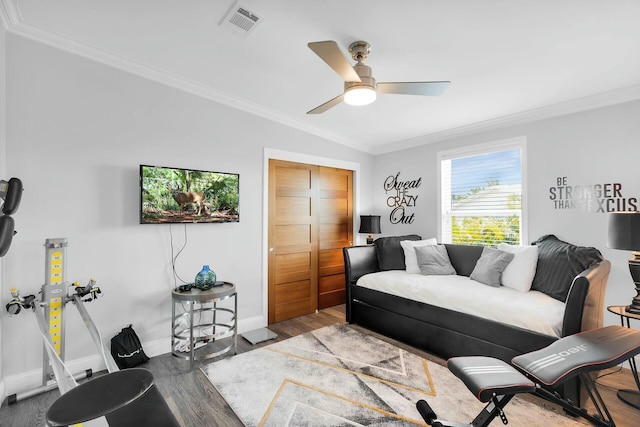 17346 Keystone Rd, Sugarloaf, FL 33042 - living area with visible vents, baseboards, a ceiling fan, wood finished floors, and ornamental molding