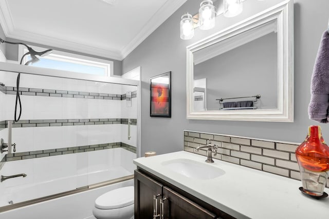 17346 Keystone Rd, Sugarloaf, FL 33042 - bathroom with toilet, vanity, crown molding, bath / shower combo with glass door, and decorative backsplash