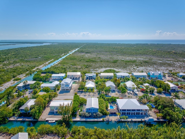 bird's eye view with a water view and a residential view